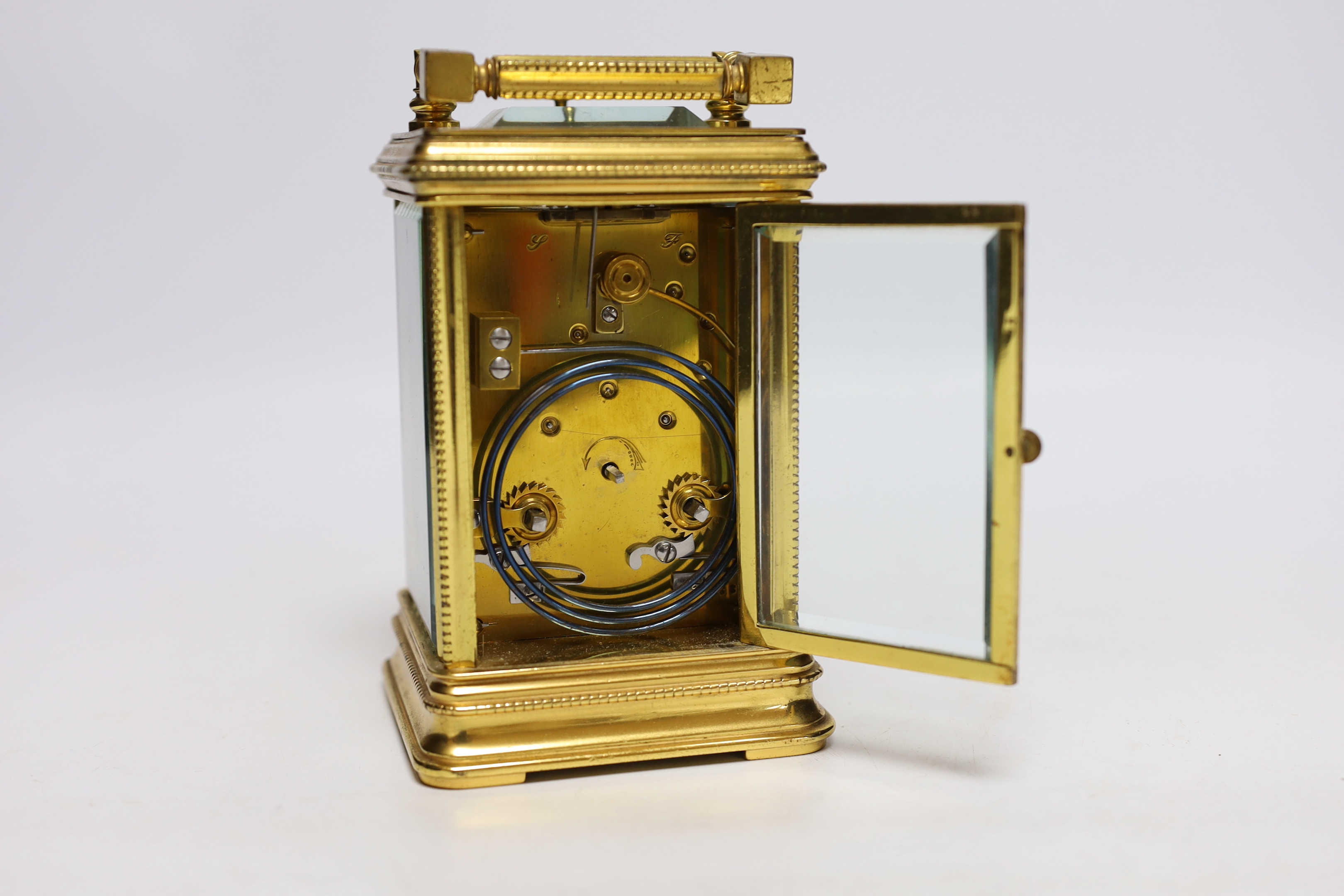 An early 20th century brass repeating carriage clock, 15cm